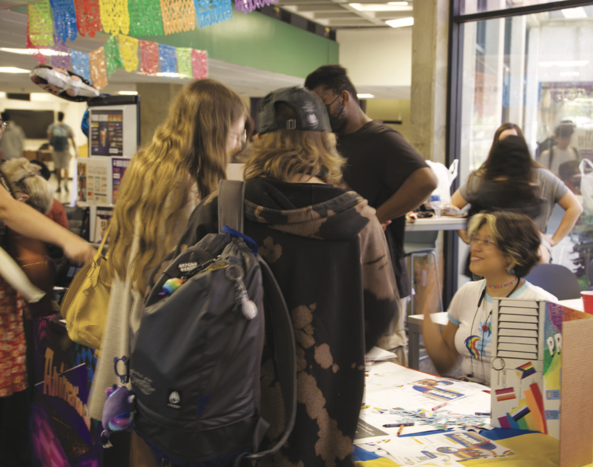 Angie Reconco talking to students at Richland’s Club Expo about Hispanic Heritage Month.